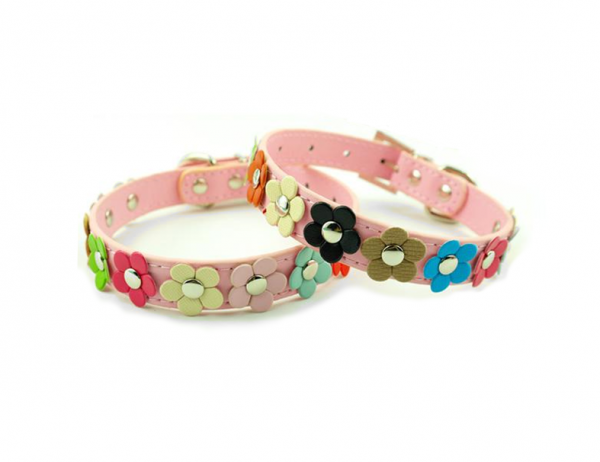 Pink leather dog collar with multi-colored 3D leather flowers attached by silver studs.